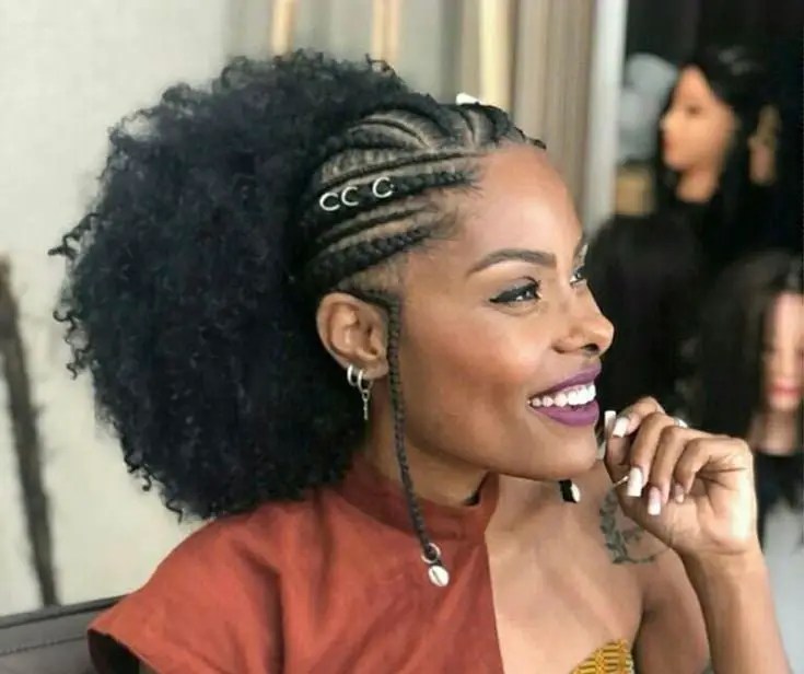 smiling lady wearing afro ponytail