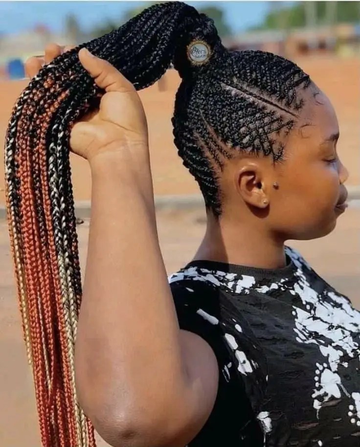 lady rocking African braided ponytail hairstyle