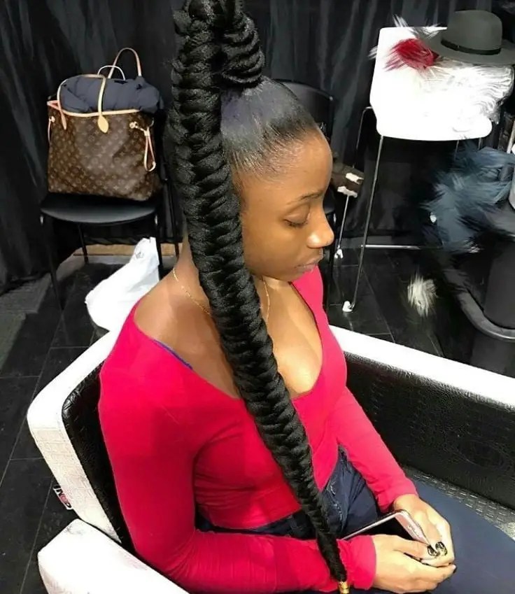 lady rocking long braided ponytail