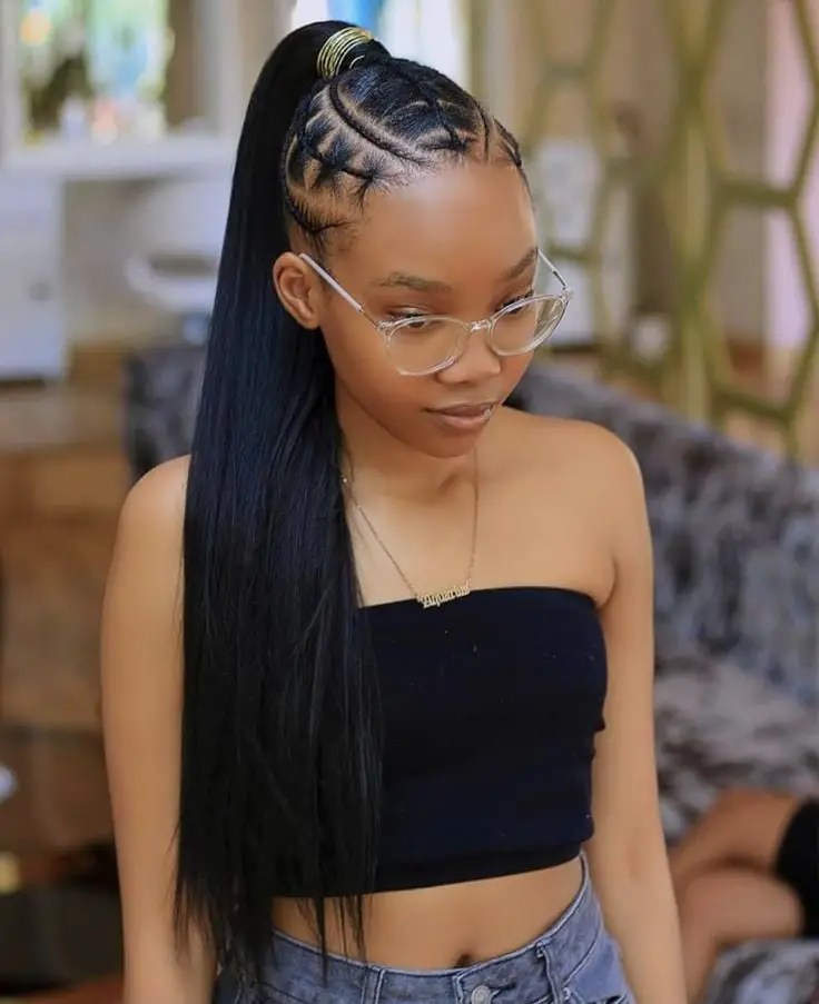 lady rocking glasses with long ponytail