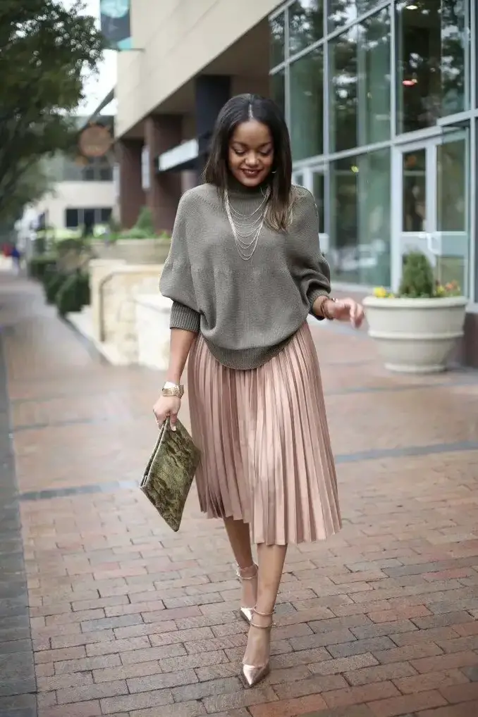 lady in a loose top - Outfits for Ladies with Big Belly