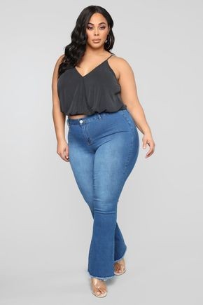 fair lady in high-waist jeans - Outfits for Ladies with Big Belly