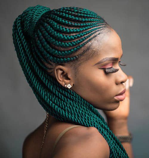 lady rocking green extension Ghana braids
