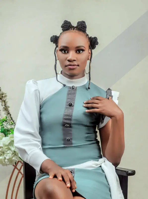 Victoria Willie wearing bantu knots with attachments