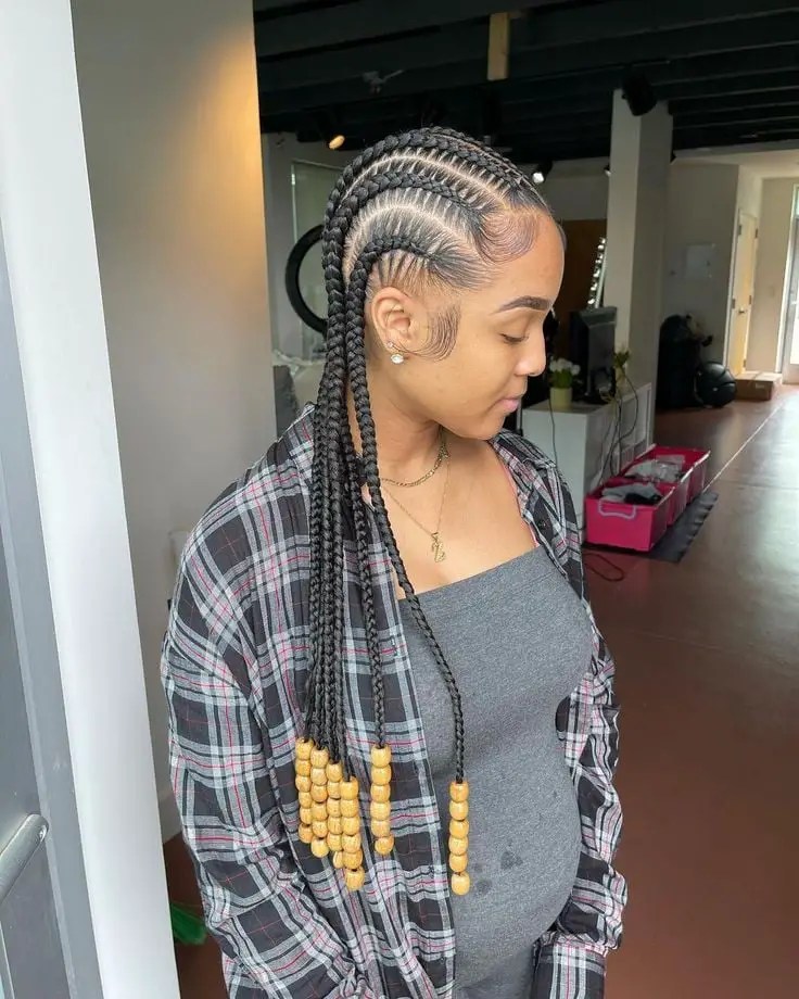 lady wearing stitch braids with accessories