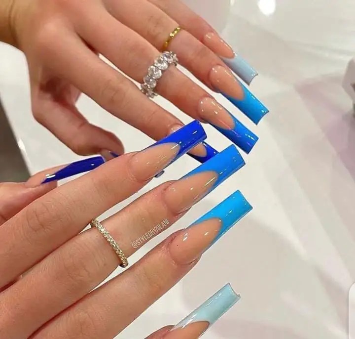 beautiful nails on fingers with rings