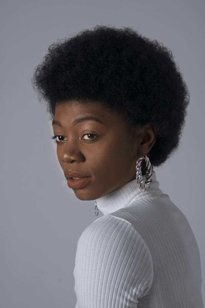 lady wearing short afro hairstyle