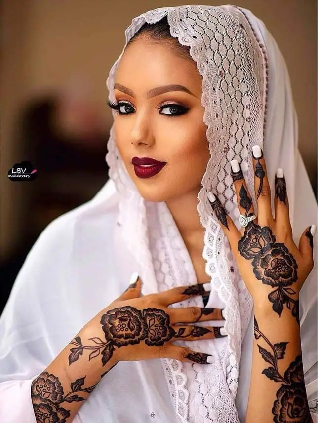 headshot of an Arewa bride wearing makeup for her traditional wedding