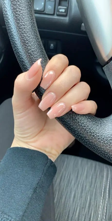 nude nails holding car steering