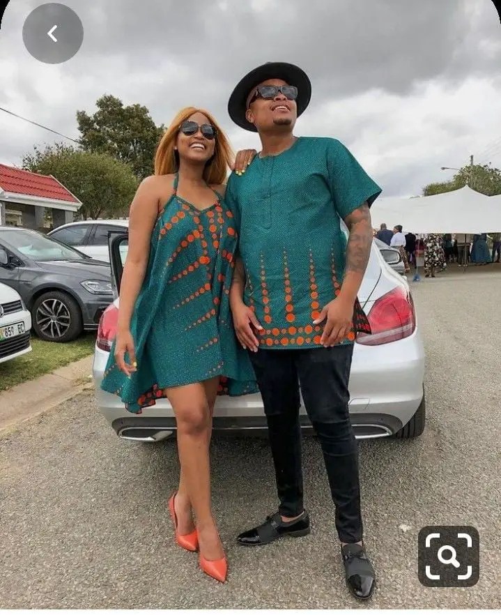 man and wife wearing matching ankara outfits