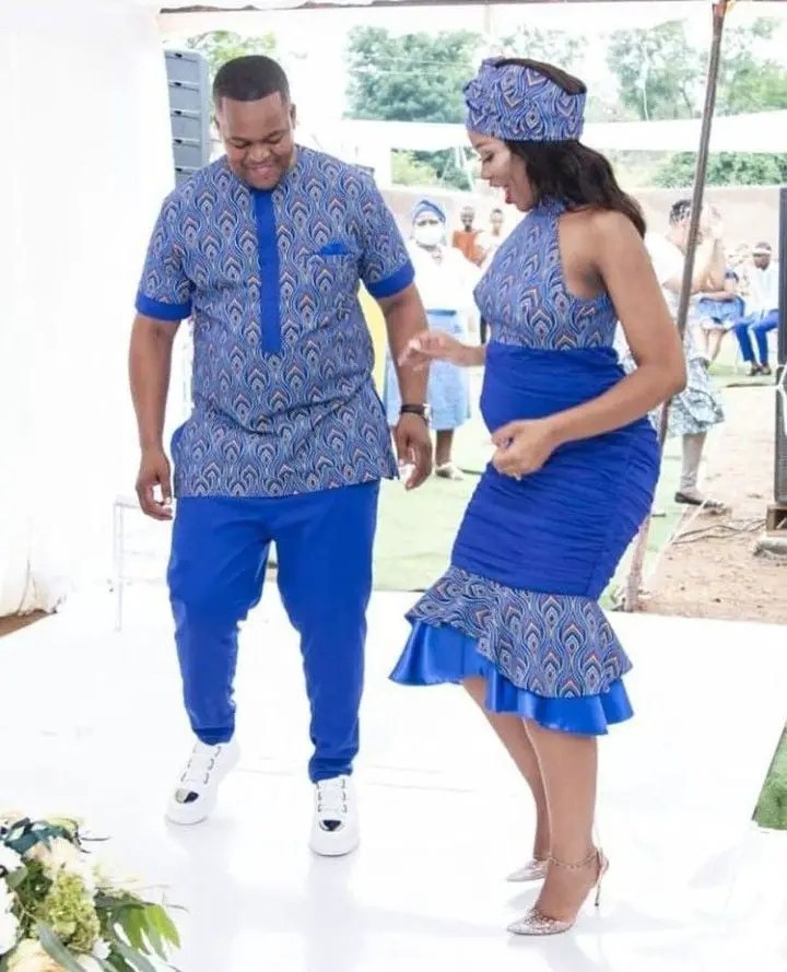 couple wearing matching ankara and blue material outfits