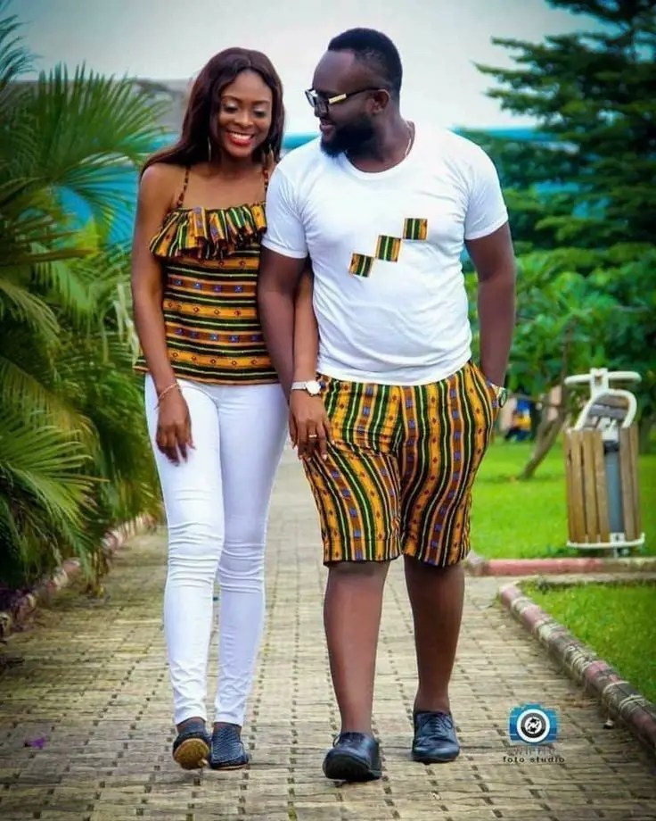 couple walking in matching Afro-urban ankara outfits
