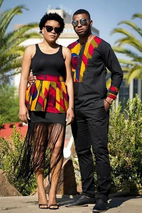 couple wearing matching ankara and black material outfits