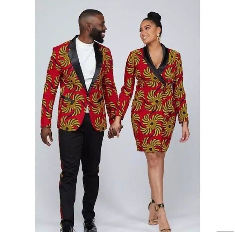 man wearing ankara blazer with wife wearing matching blazer gown