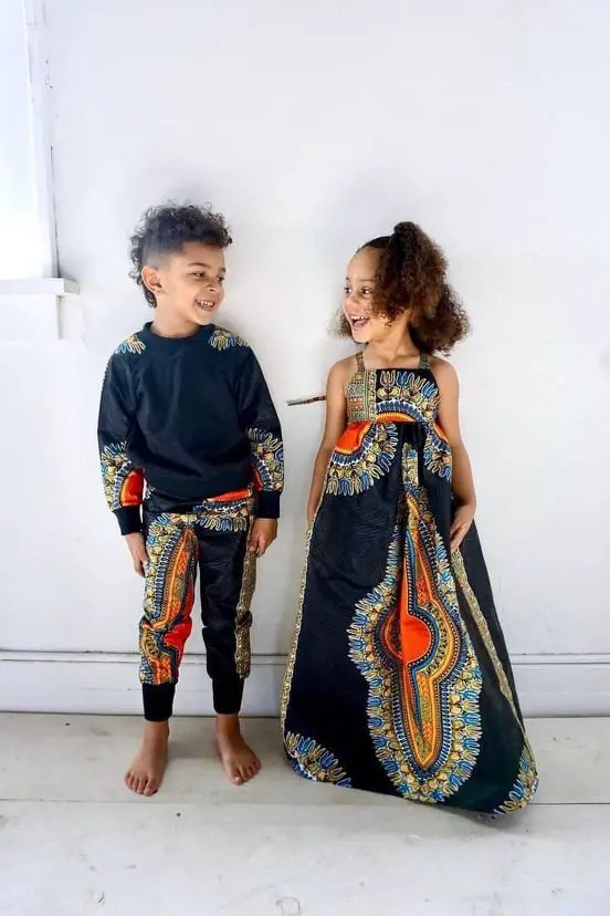 boy and girl wear dashiki print outfits