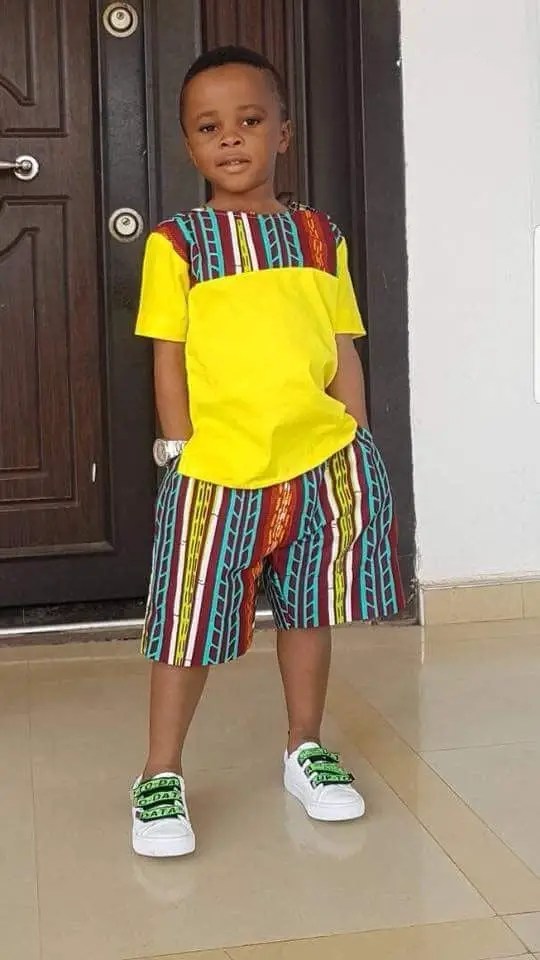 boy wearing ankara and yellow material outfit