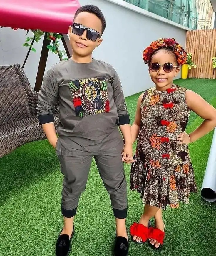 boy and girl wearing ankara outfits