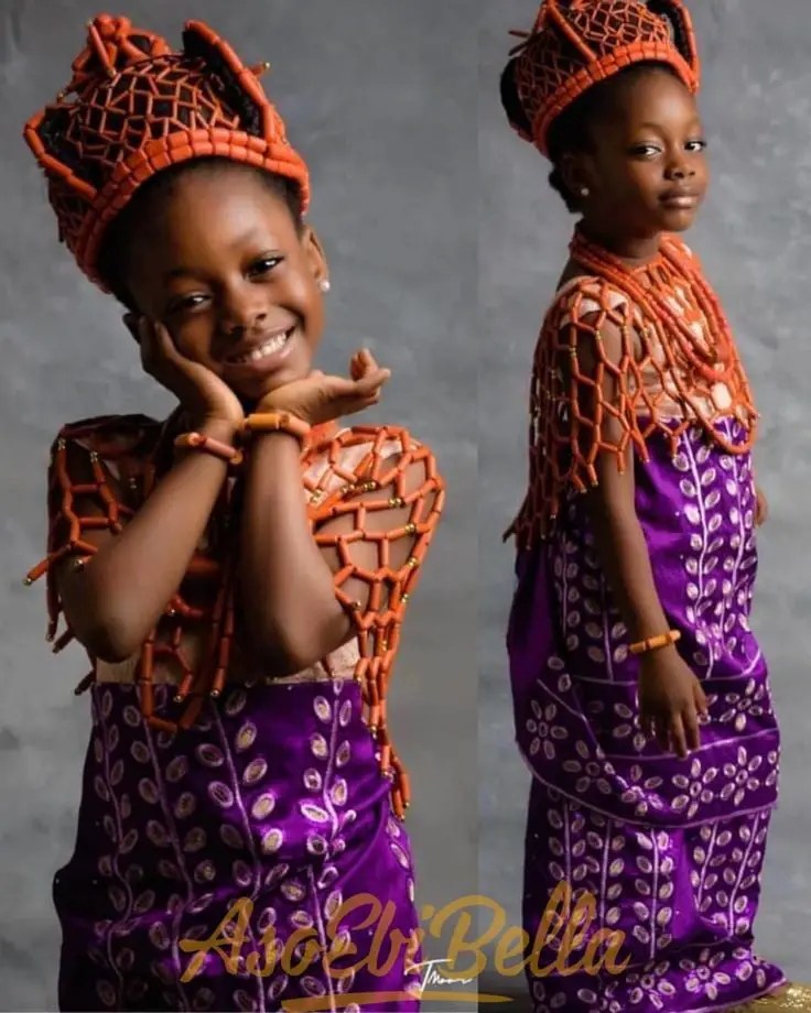 smiling girl wearing native outfit