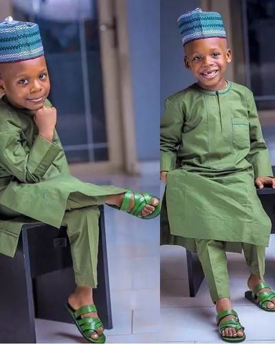 Hausa boy wearing green kaftan with cap