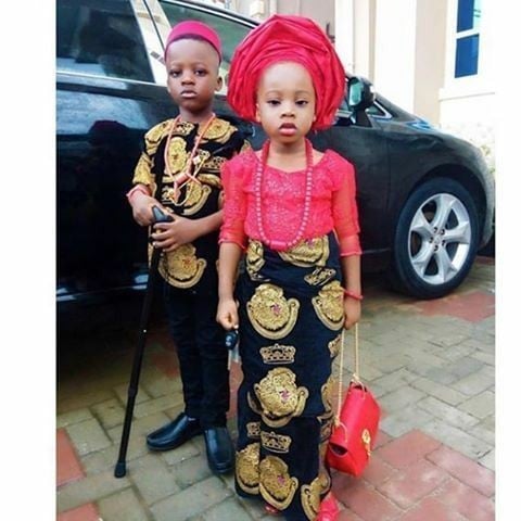 boy and girl wearing Igbo native outfits