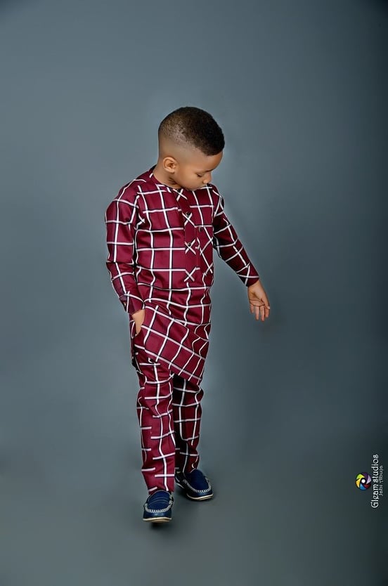 boy wearing chequered senator outfit