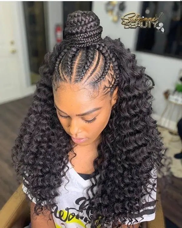 lady rocking braided ponytail with wavy weaves