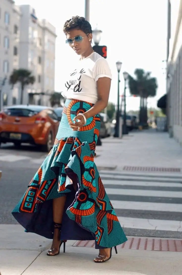 lady wearing white T-shirt on ankara skirt