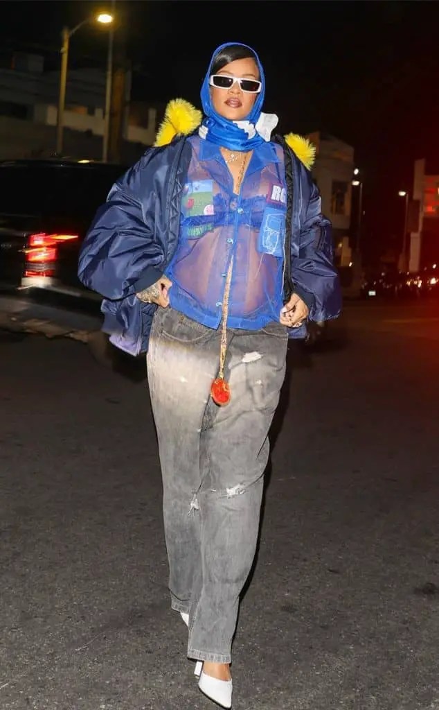 Rihanna in a light maternity top