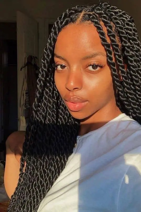 Pretty woman wearing senegalese braids