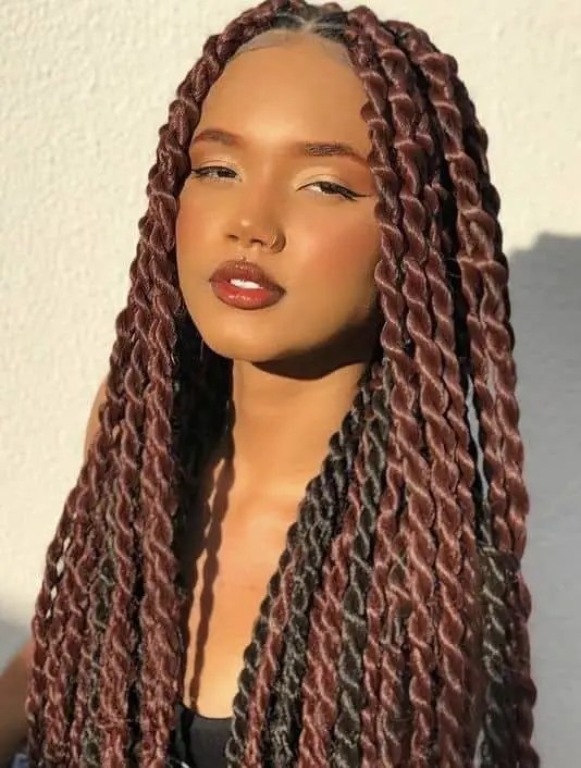 beautiful lady wearing long brown Senegalese braids