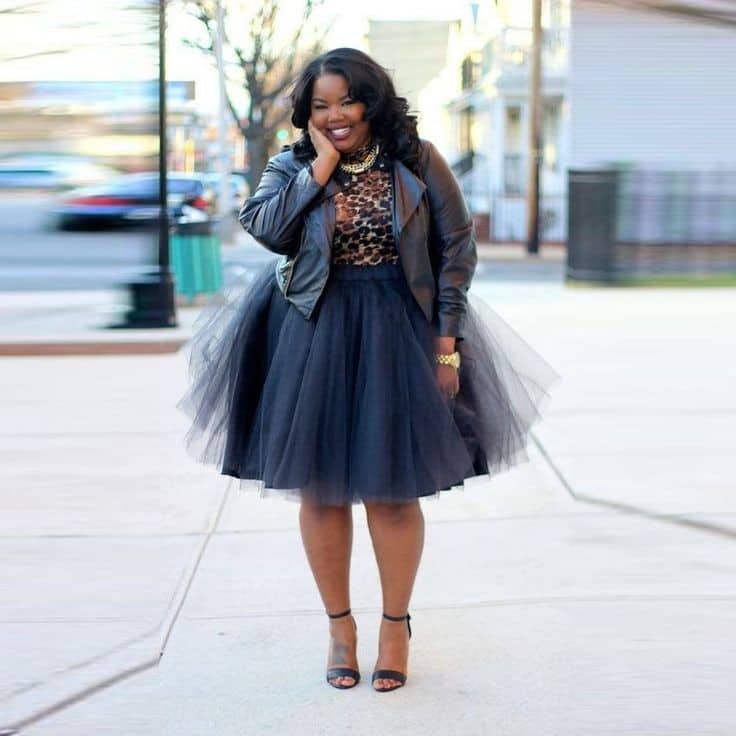 Plus size woman in a layered tulle dress for a birthday event