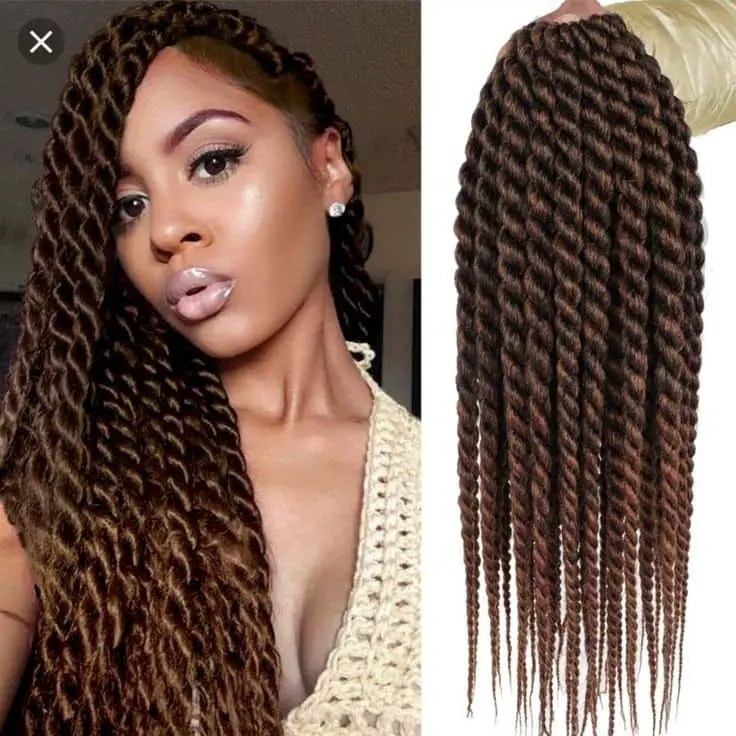 Woman wearing a brown quarter note Senegalese braid