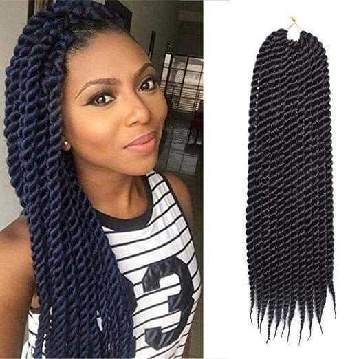 Smile woman rocking quarter note senegal braid