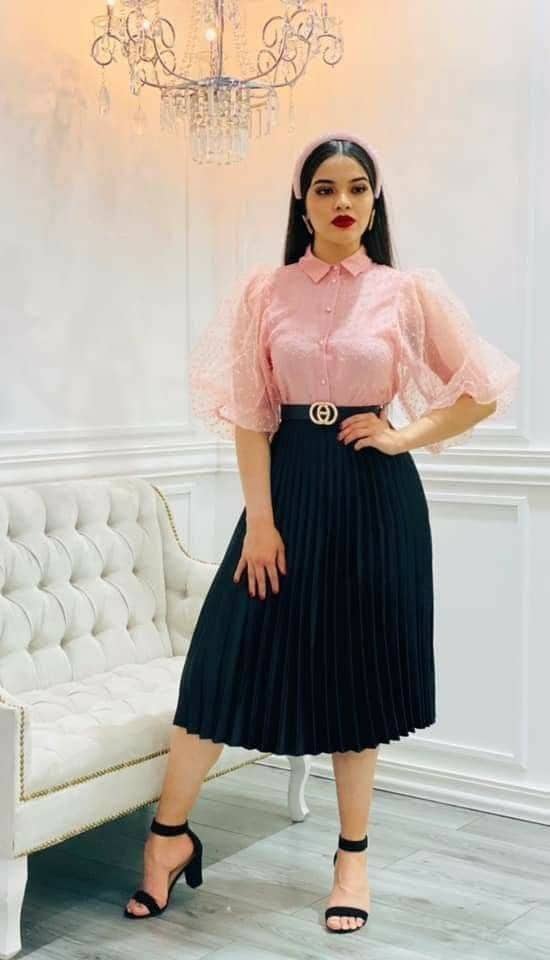 lady wearing flared skirt with accessories