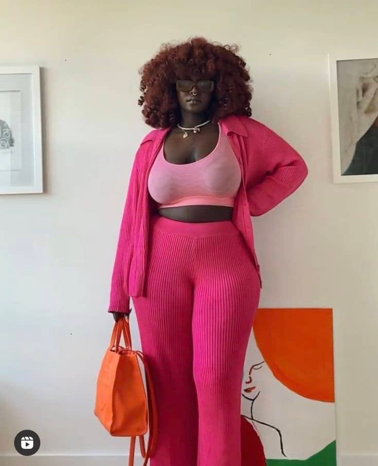 Woman wearing pink top and pants