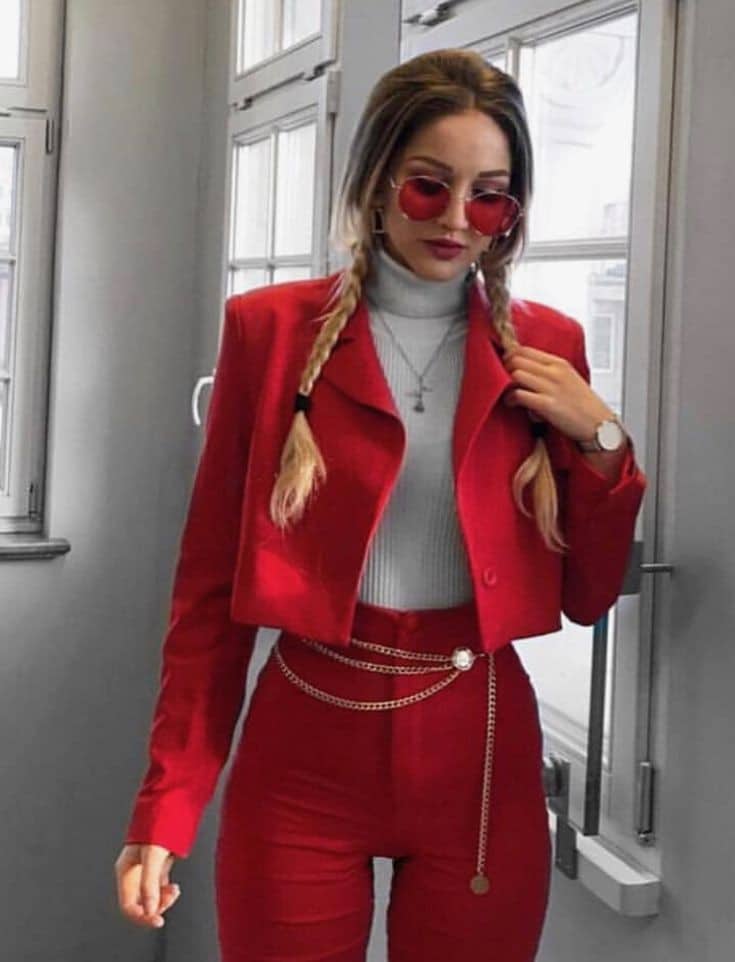 Woman wearing a red pantsuit