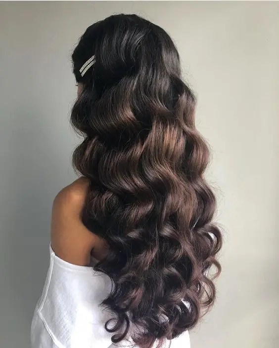 Back view of woman rocking long hairstyle