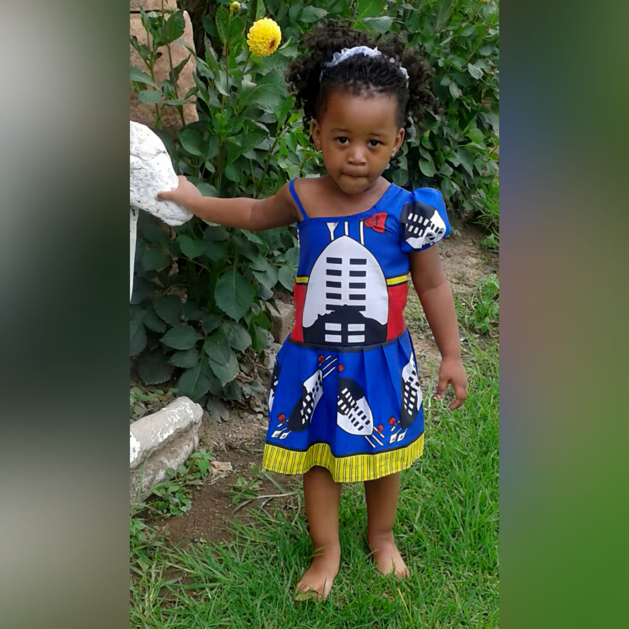 Girl in modern Swazi traditional costume