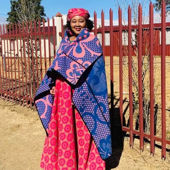 Smiling woman in traditional Sotho costume