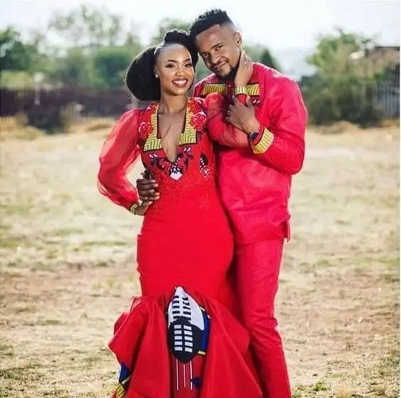 Happy couple wearing modern Swazi traditional clothes