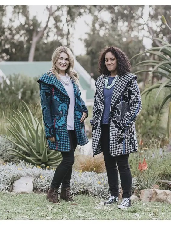 Two women in Sotho fabric blazers