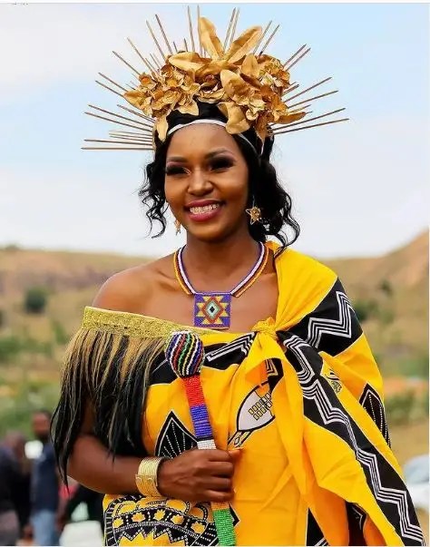 Smiling woman in traditional Swazi costume