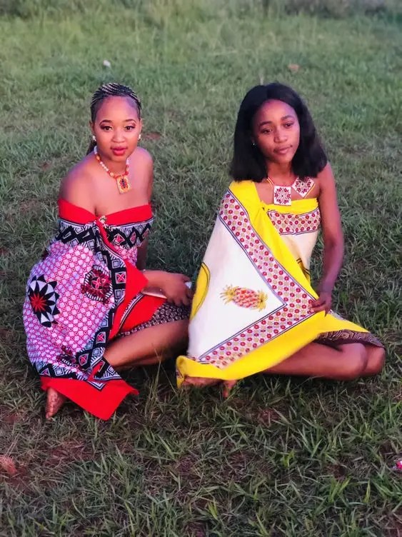 Two women in traditional Swazi costumes