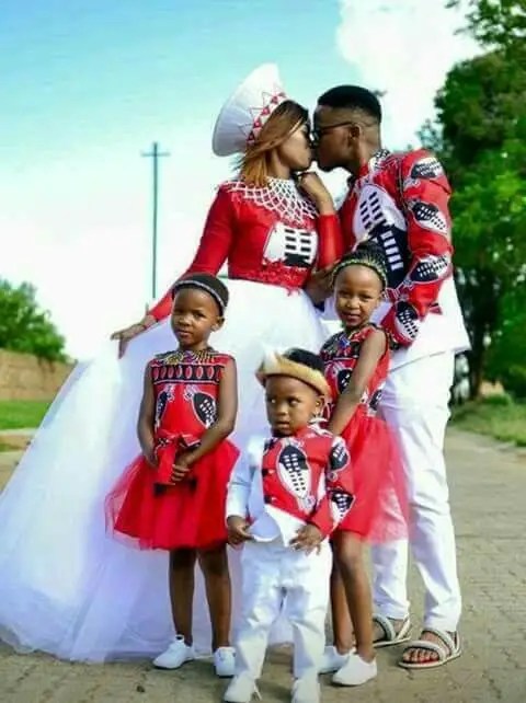 South African family wearing modern Swazi traditional clothing