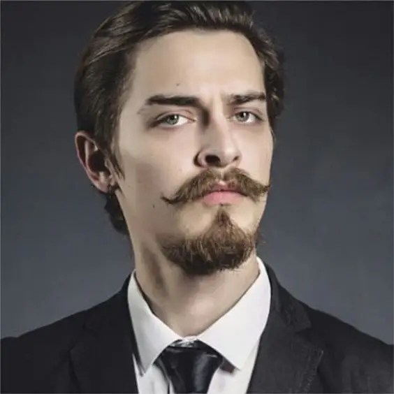 The Man Discovering Modern Handlebar Mustache Styles