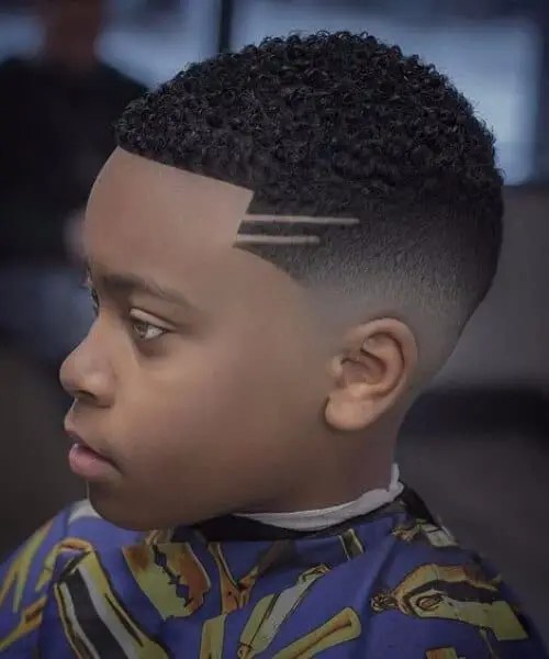 black boy wearing short hair fade