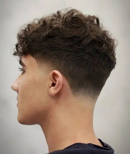 Caucasian boy wearing faded hair