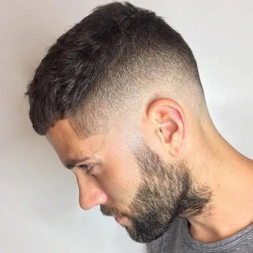 man wearing a fade with short hair