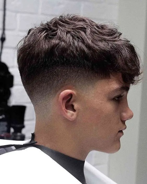 Young Caucasian man wearing short hair fade