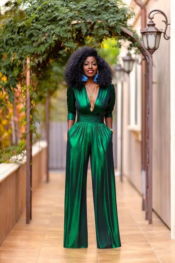 Woman realizes cute outfit ideas in green jumpsuit